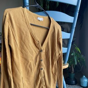 Orange Cardigan, originally made in India. No rips nor stains nor loose threads.